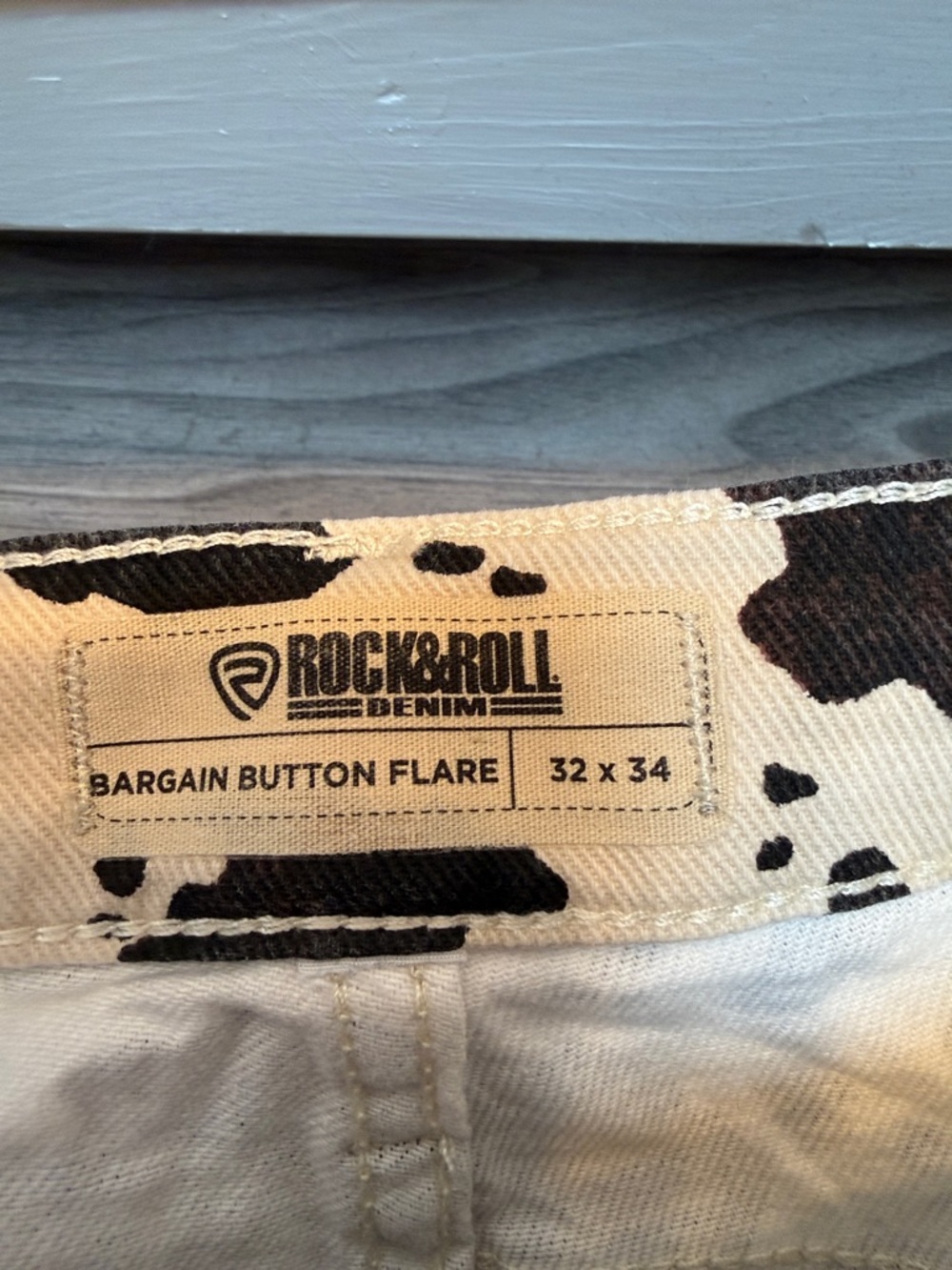 Cow-Print Flared Jeans - Black & Cream - Picture 2 of 6